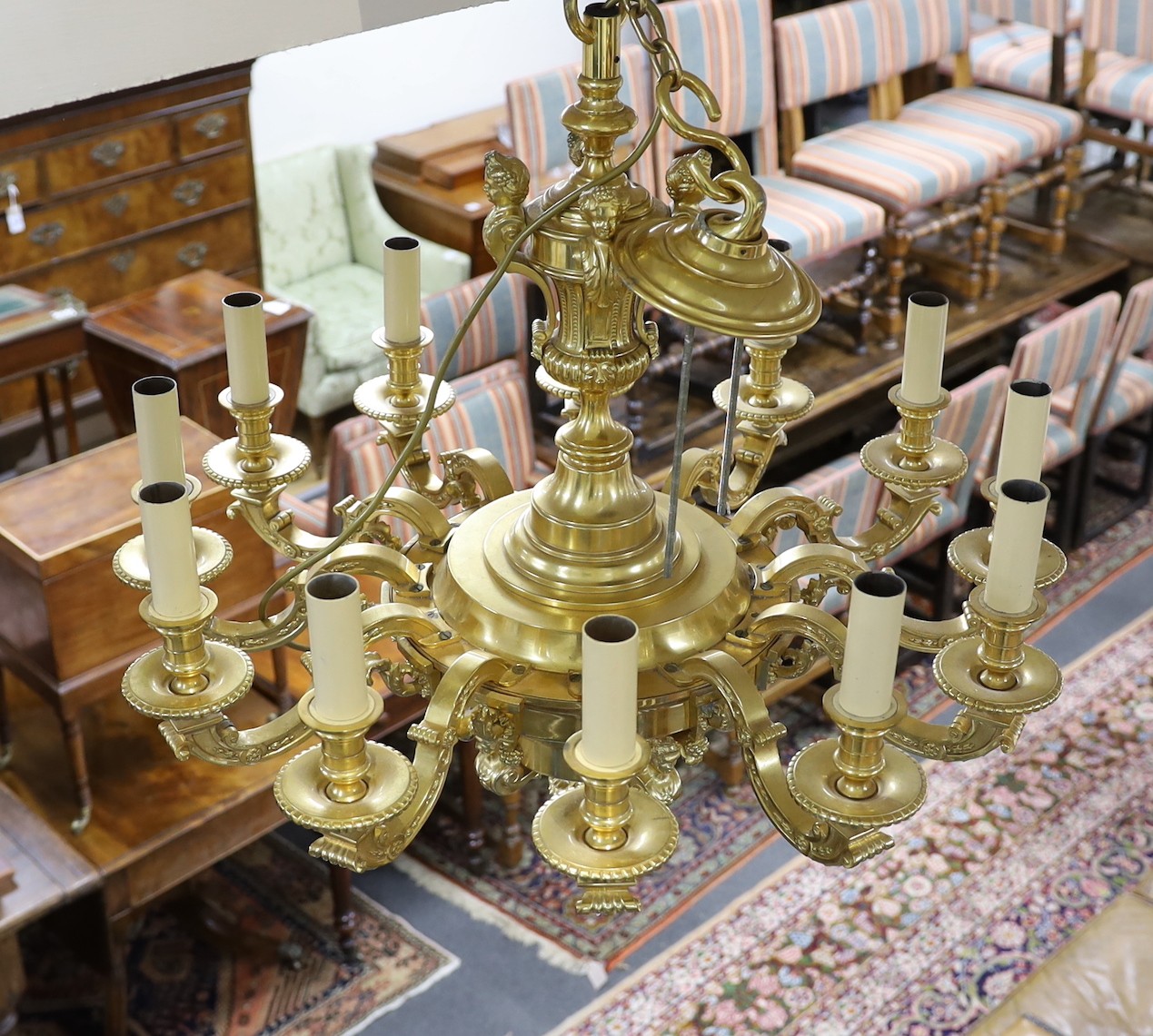 A 20th century brass and ormolu chandelier, after a design by Daniel Marot